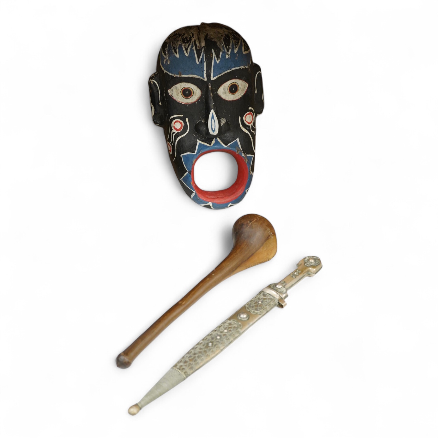 An African hardwood throwing club together with a painted mask and a Caucasian style dagger kindjal, largest 34cm high